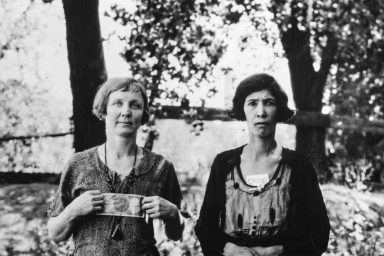 Two women in Louisville holding scrip