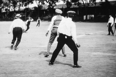 Men playing Baseball