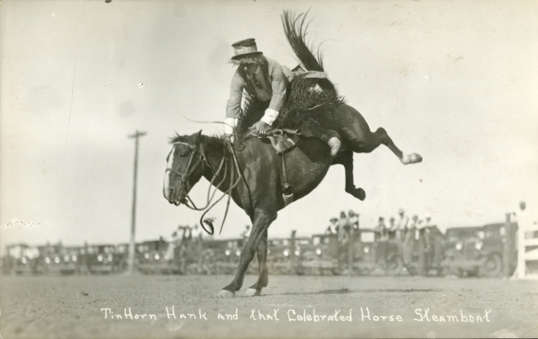 Tin Horn Hank riding bronco