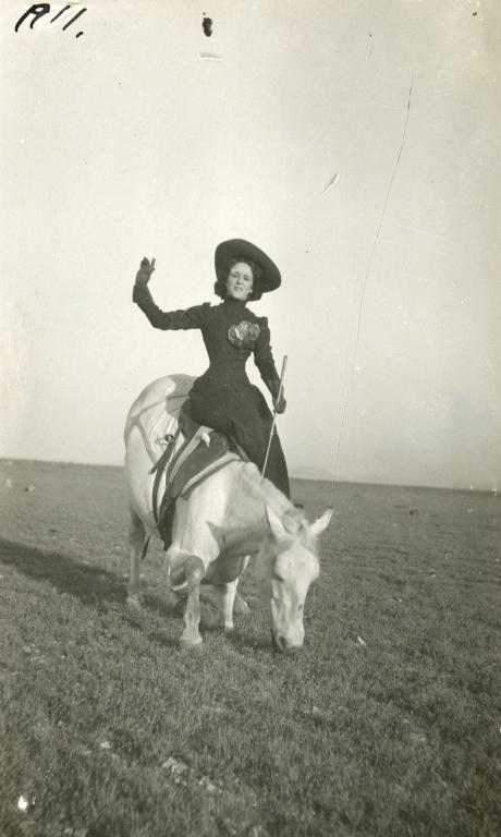 Woman circus performer on bowing horse