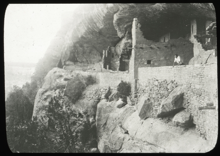 Man looking over wall, Ruins, Southwest, U.S.
