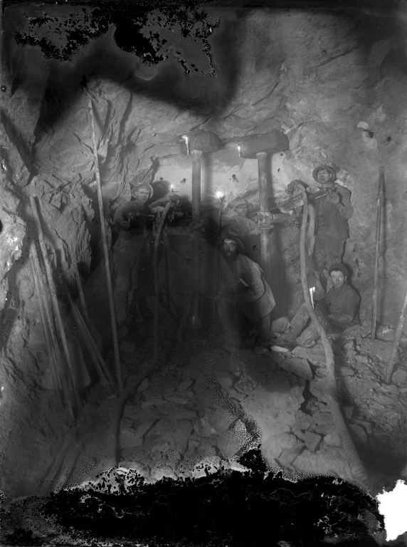 Portrait of miners inside mine