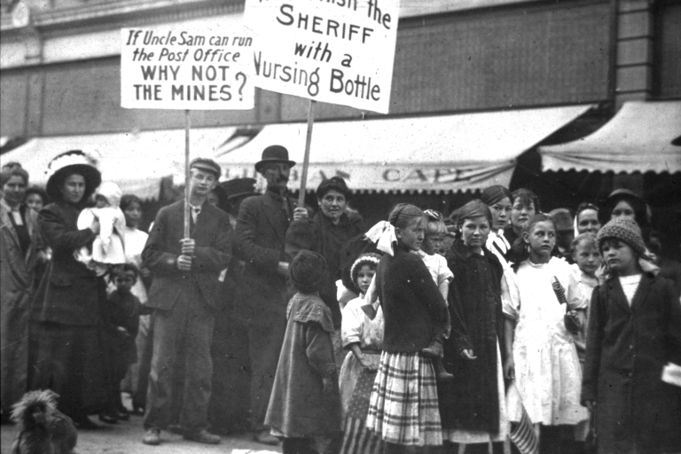 People marching with picket signs