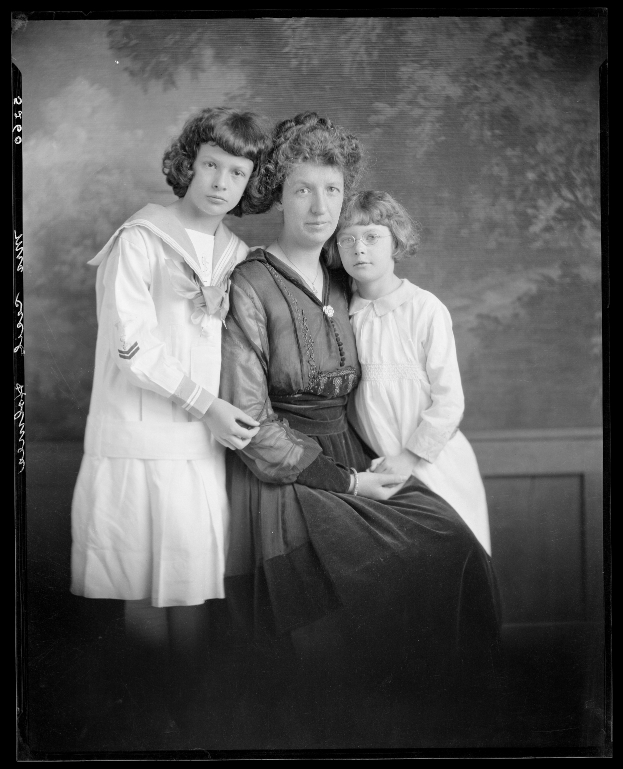 Portrait of unidentified woman and children