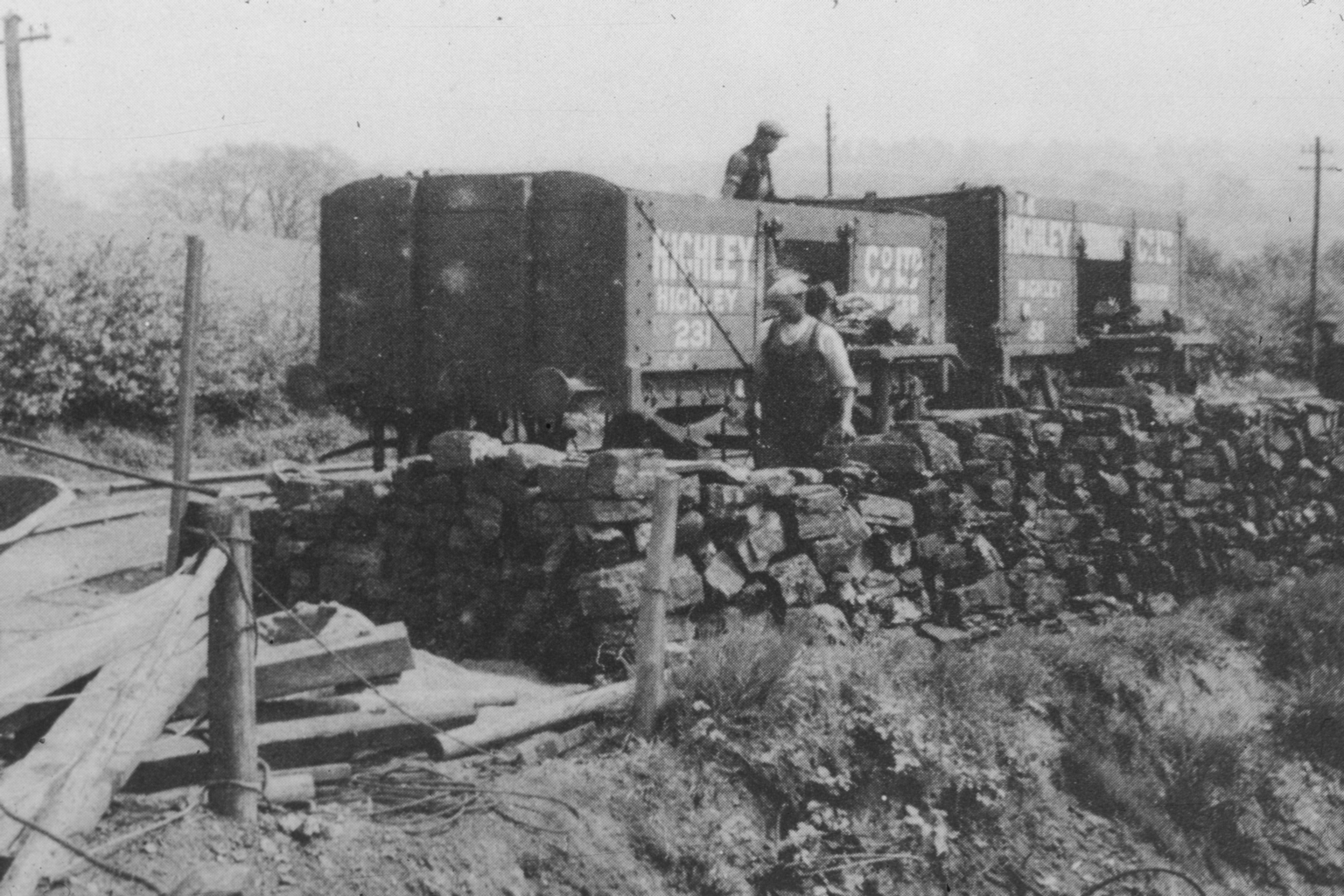 Miners loading railroad freight cars